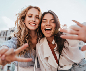two girls taking selfie