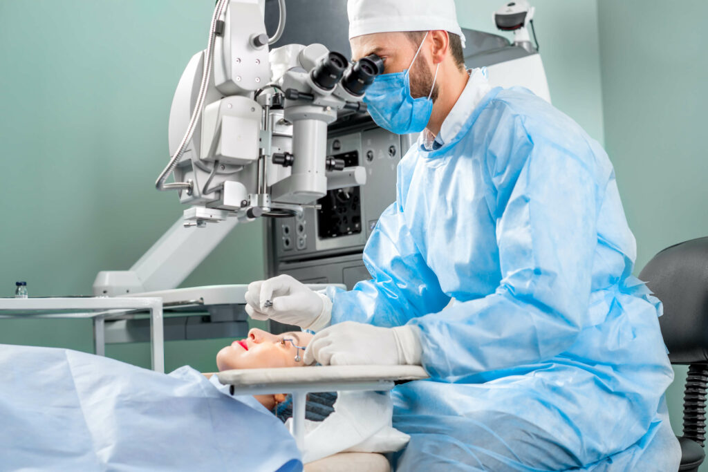 ophthalmologist performing cataract surgery on woman